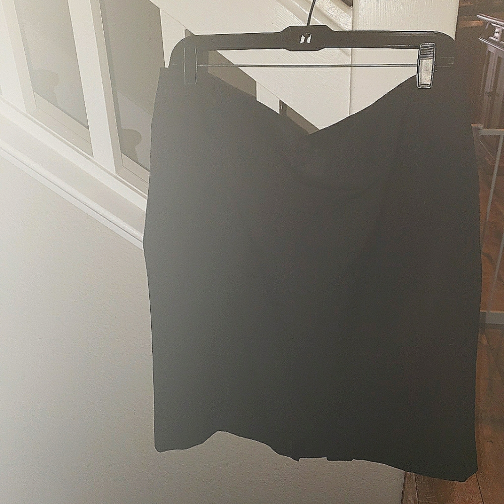 Ladies black lined straight skirt with tapered split